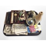 A group of antiquarian postcards, cutthroat razors, hydrometer in fitted case,