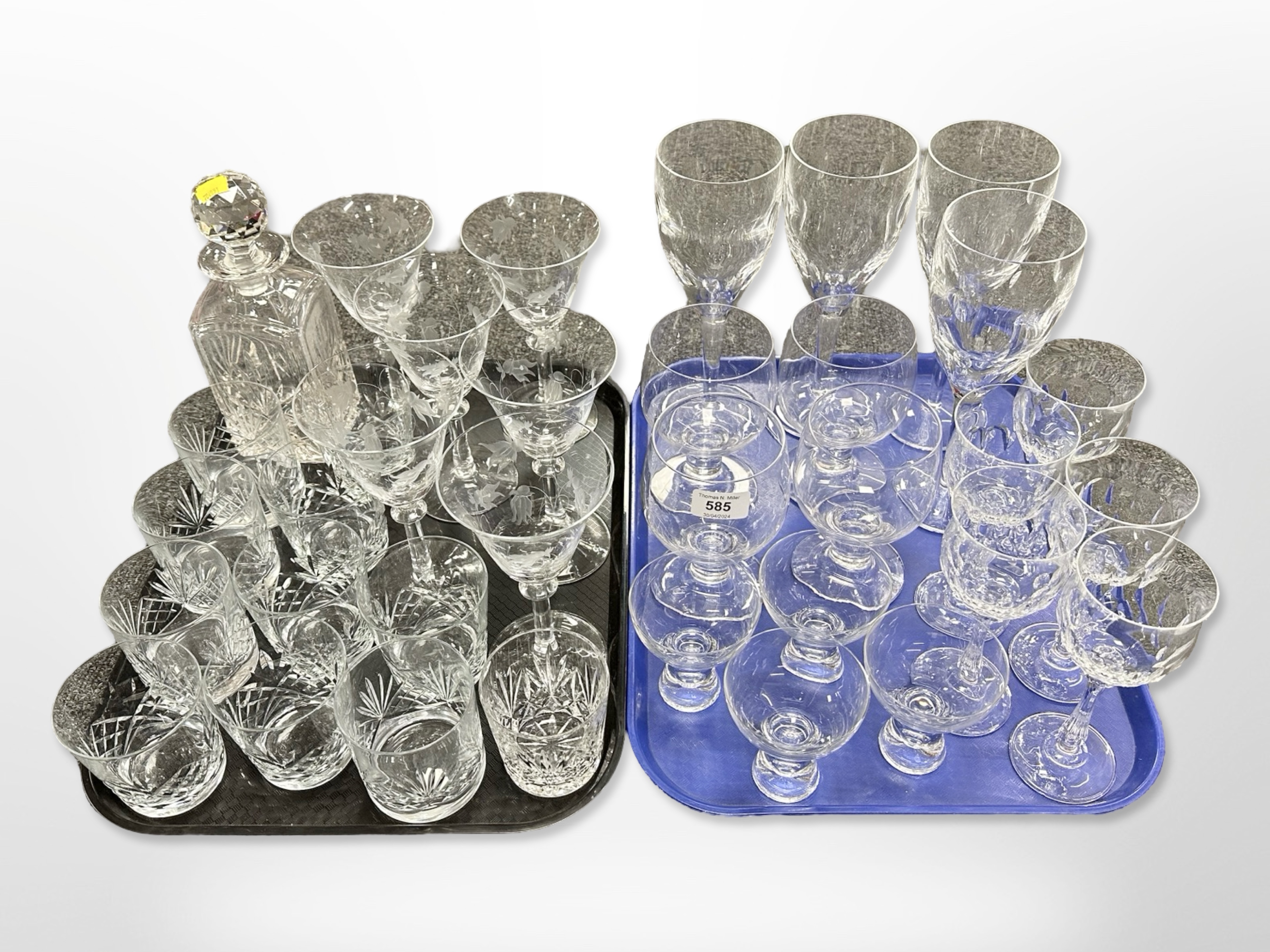 A collection of 20th-century drinking glasses including large wine glasses, tumblers,