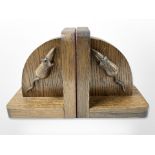 A pair of oak bookends each with carved mouse, height 15 cm.