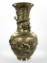 A Chinese bronze vase decorated with mythical beasts, height 23cm.