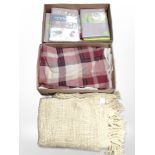 Several packs of duvet covers, woollen throws and blankets, etc.
