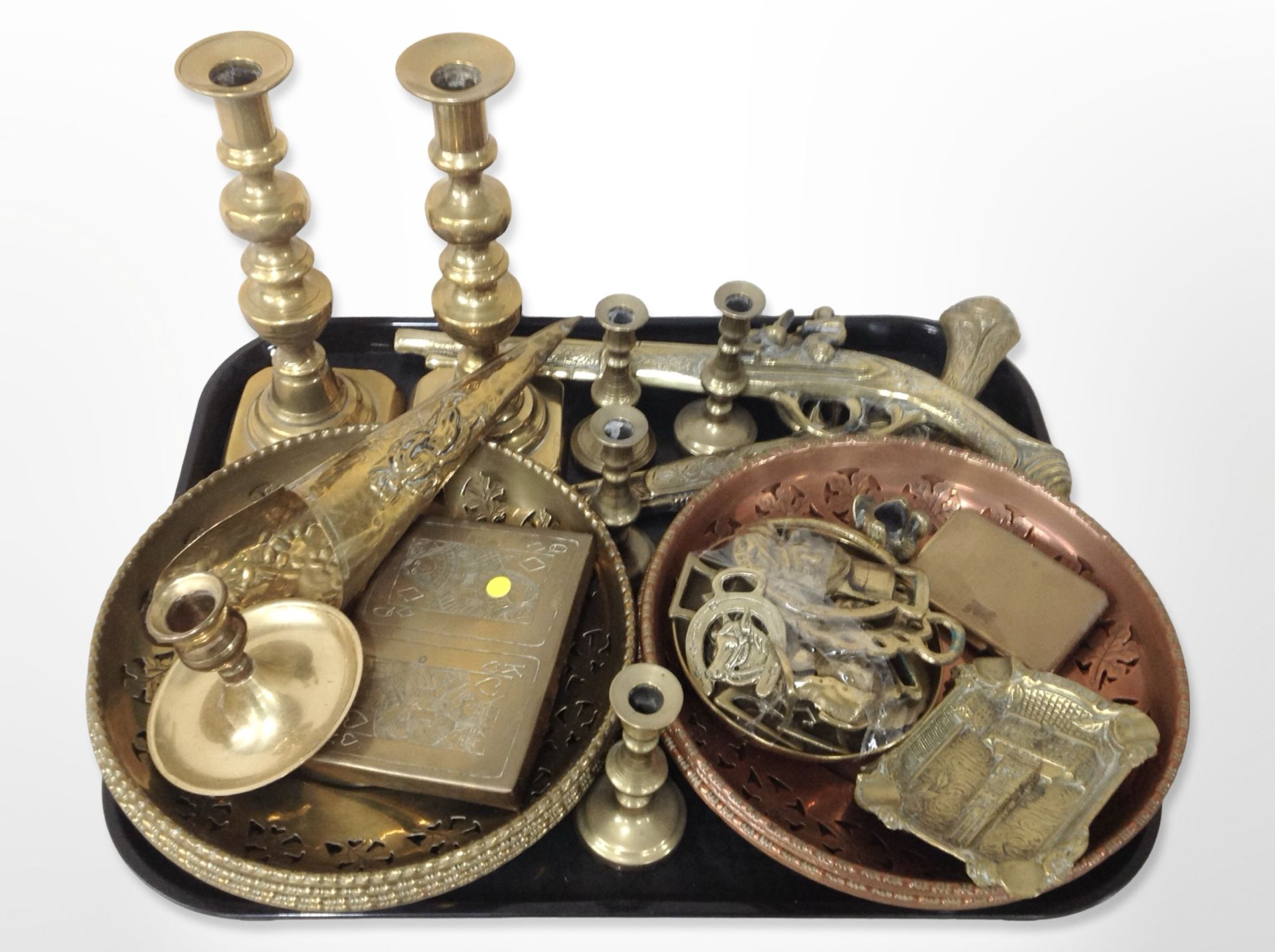 Brass and copper wares including ornamental flintlock pistols, pair of candlesticks,