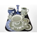 A group of Wedgwood green and blue Jasperware including jugs, candlestick, trinket boxes, etc.
