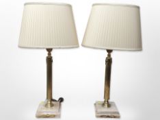 A pair of contemporary gilt brass and marble classical style table lamps,