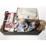 A group of dolls and accessories including Sindy's wardrobe in box, etc.