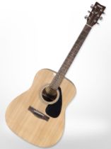 A Yamaha model F310 acoustic guitar.