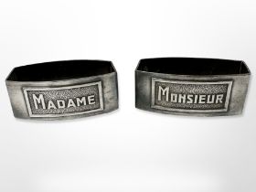 A pair of French Art Deco silver plated napkin rings 'Monsieur and Madame'.