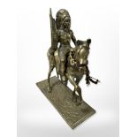A heavy brass figure modelled as an American Indian on horseback, height 23 cm.