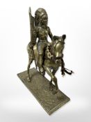 A heavy brass figure modelled as an American Indian on horseback, height 23 cm.