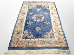 A Chinese rug on blue ground,