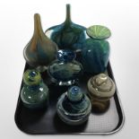 A group of Mdina studio glass vases and bottles with stoppers.