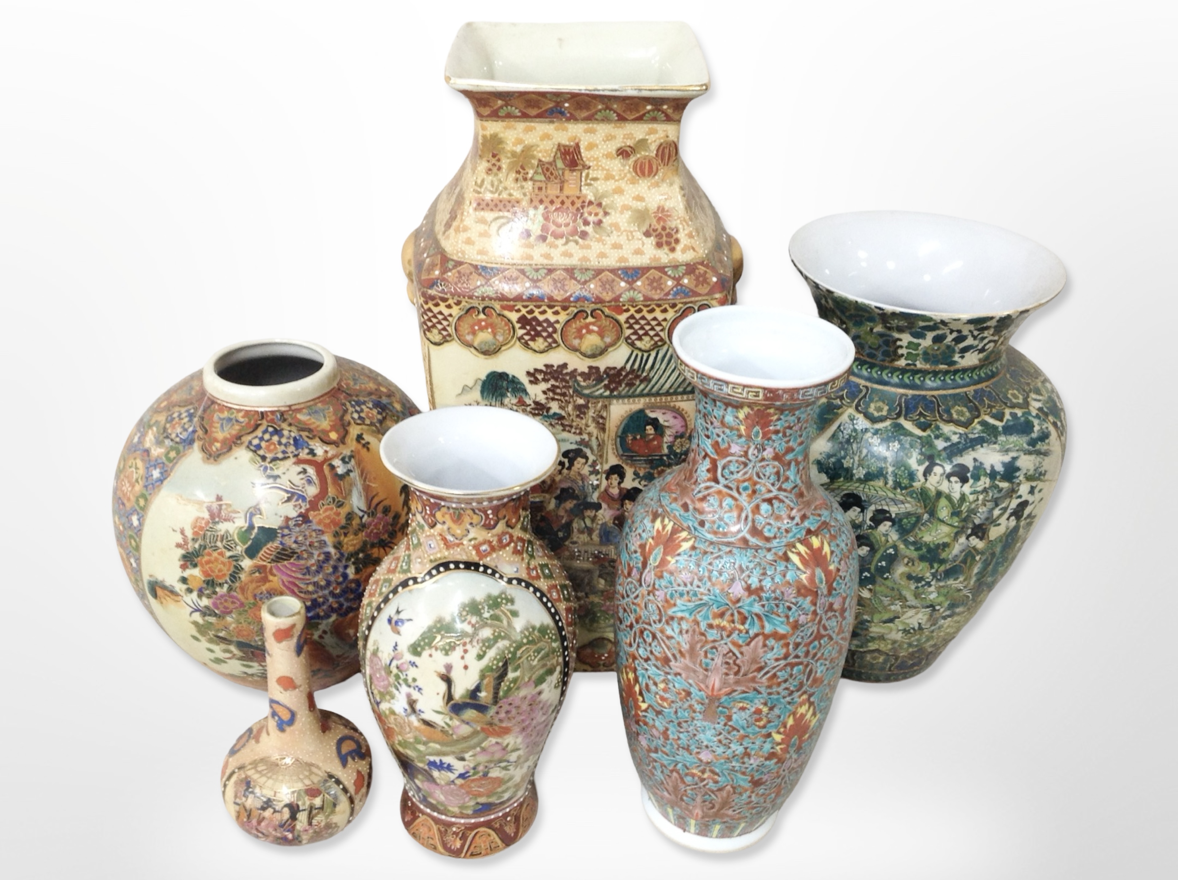 A group of mainly Japanese earthenware export vases, tallest 41cm.