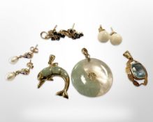 A Chinese gold-mounted hardstone pendant, similar dolphin pendant,