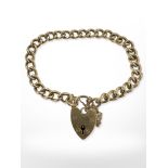 A 9ct yellow gold bracelet with heart clasp, 17 cm long approximately.