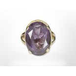 An 18ct yellow gold ring set with an amethyst, size M. CONDITION REPORT: 5.4g.