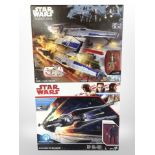 Two Hasbro Disney Star Wars models, Rebel U-Wing Fighter and Kylo Ren's Tie Silencer, boxed.
