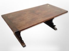 An oak refectory coffee table, 90cm long x 40cm wide x 37cm high.
