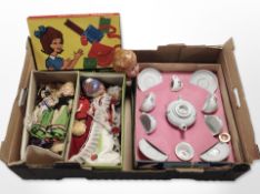 A child's porcelain tea set, Marbury leather craft set, dolls, etc.
