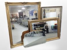 Three gilt framed mirrors and an Art Deco un-framed mirror,