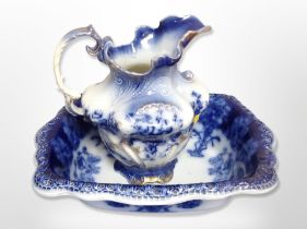 A Victorian blue and white transfer printed wash jug and basin