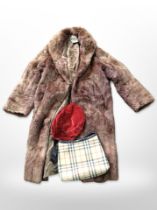 A lady's three quarter length mink fur coat by Marcus together with Burberry shoulder bag