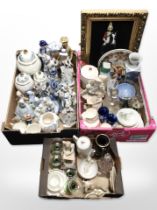 A quantity of continental porcelain figurines, lustre vases, drinking glasses, gilt-framed painting,