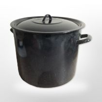 An enamelled twin-handled kitchen pot, height 30cm.