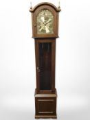 An oak Tempus Fugit grandfather clock, height 144cm, with pendulum and weights.