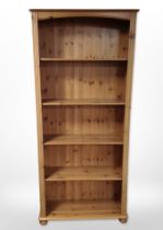 A contemporary pine bookcase,