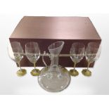 A set of four contemporary crystal and enamelled metal wine glasses with matching ewer,