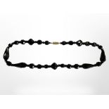 An antique Whitby jet necklace, length 40 cm.