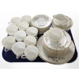 40 pieces of late-19th century gilt porcelain tea china.