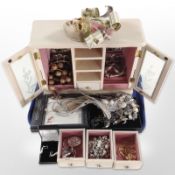 A contemporary jewellery box containing costume jewellery,