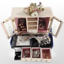 A contemporary jewellery box containing costume jewellery,