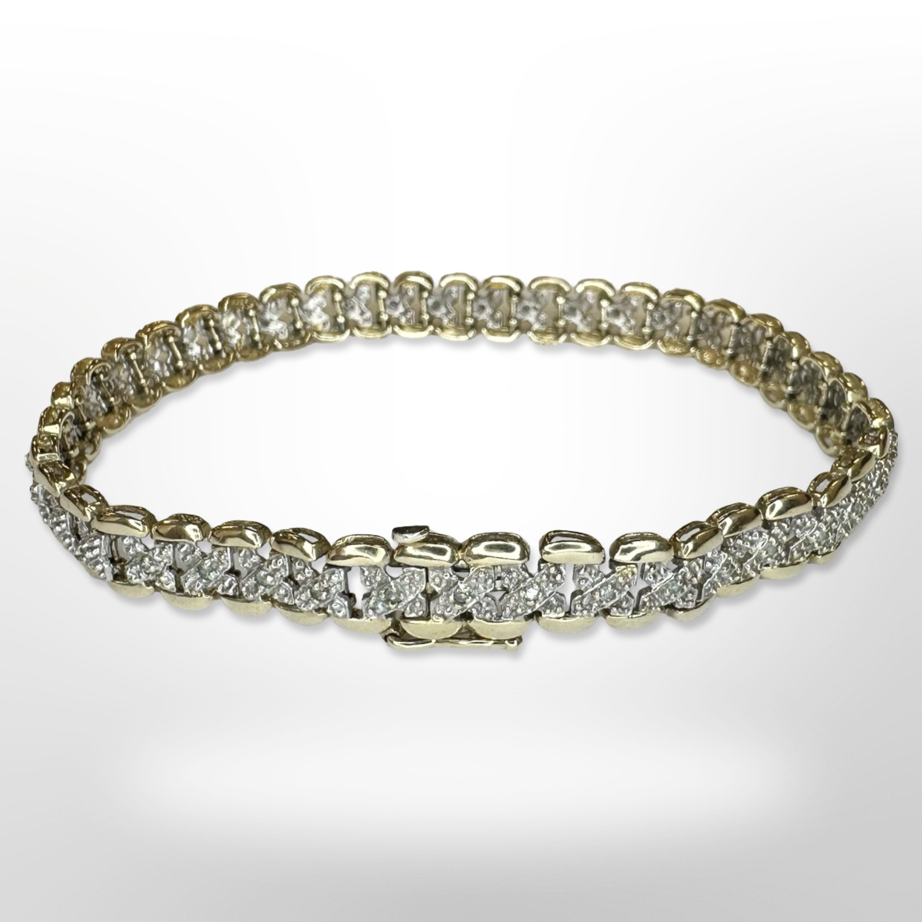 A 9ct yellow gold bracelet set with diamonds, length 19 cm. CONDITION REPORT: 9.6g.