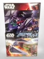 Two Hasbro Disney Star Wars figures, First Order Special Forces Tie Fighter and Tie Striker, boxed.