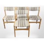 A set of four Danish beech framed dining chairs in striped oatmeal fabric