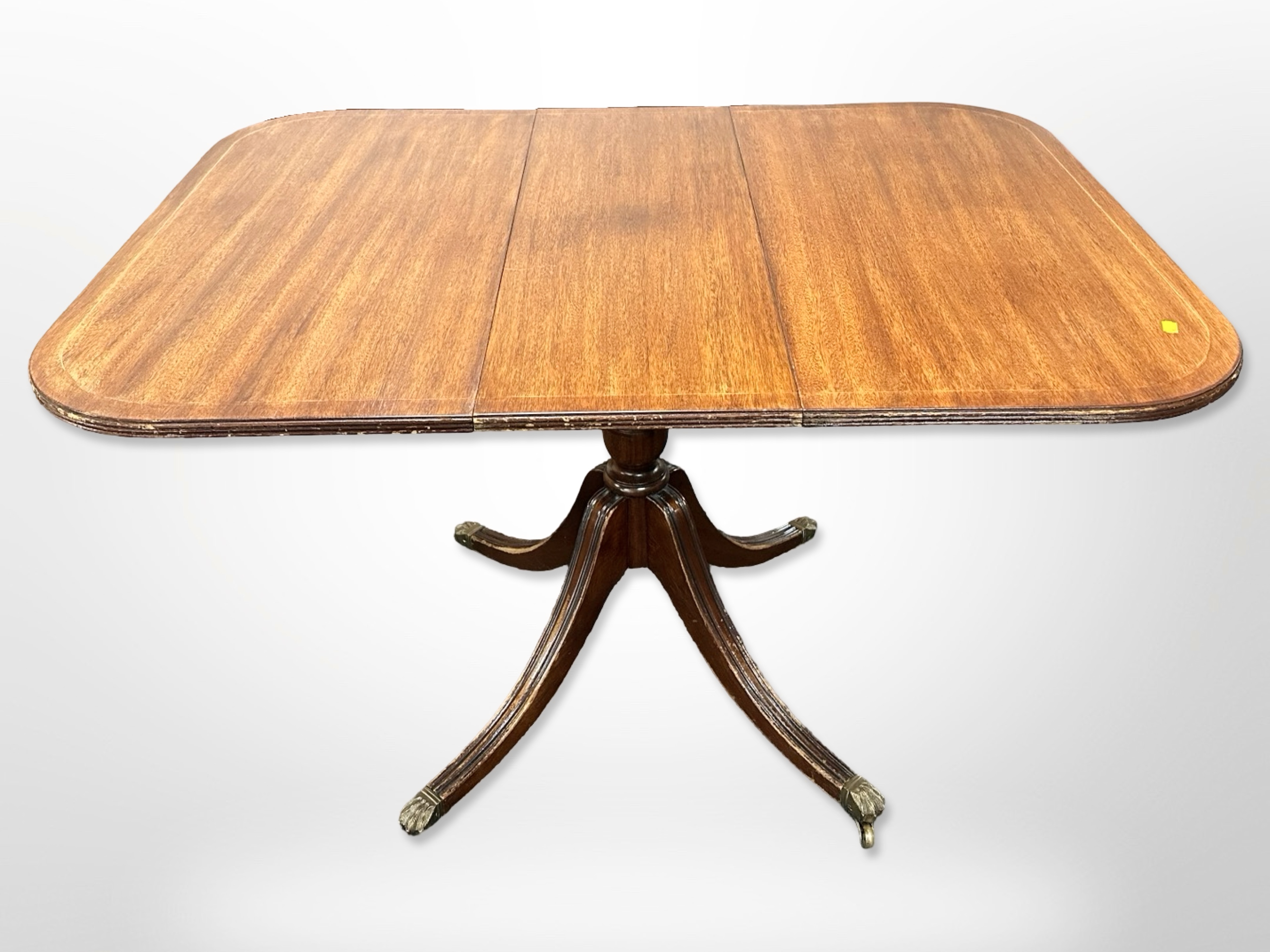 A reproduction mahogany dining room suite comprising of extending dining table, length 123 cm,