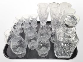 A crystal decanter and assorted drinking glasses.