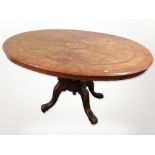 A Victorian walnut and satinwood inlaid oval breakfast table,