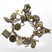 A 9ct yellow gold charm bracelet CONDITION REPORT: 46.7g gross.
