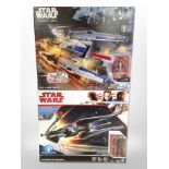 Two Hasbro Disney Star Wars figures, Kylo Ren's Tie Silencer and Rebel U-Wing Fighter, boxed.