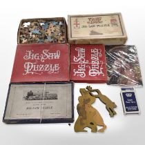 A group of vintage puzzles, Know Your Navy ship silhouette playing card game, etc.