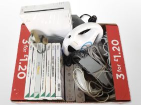 A Nintendo Wii console, accessories and several games.