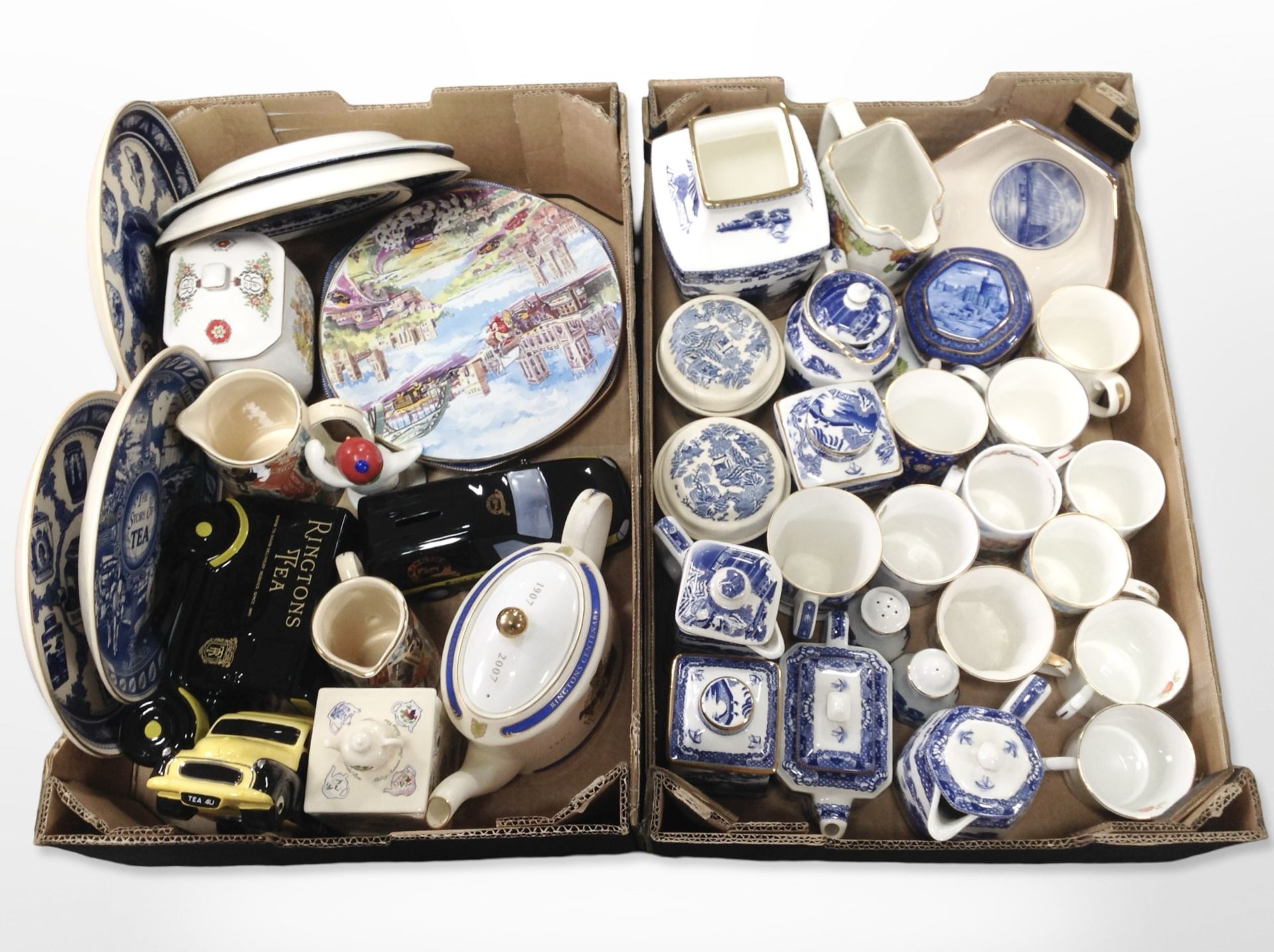 A quantity of Ringtons blue and white teapots, caddies, plates, mugs, etc.