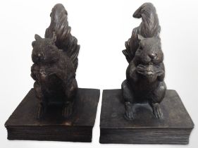 A pair of resin squirrel bookends,