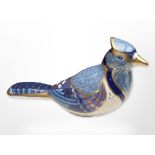 A Royal Crown Derby bird paperweight with gold stopper.