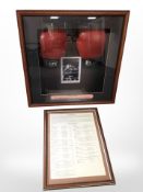 A framed pair of Ken Buchanan's boxing gloves,