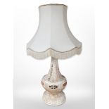 A contemporary pottery lamp base with shade,