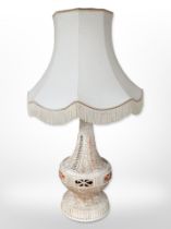 A contemporary pottery lamp base with shade,